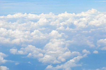 bright blue sky with cloudsの写真素材