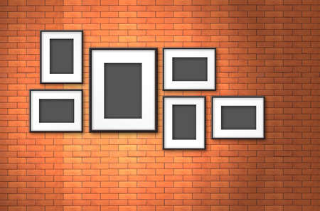 blank photo frame on old brick wallの写真素材