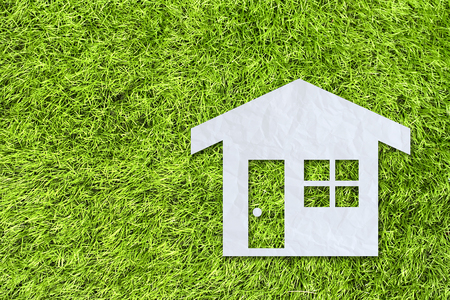 House on green grass backgroundの写真素材