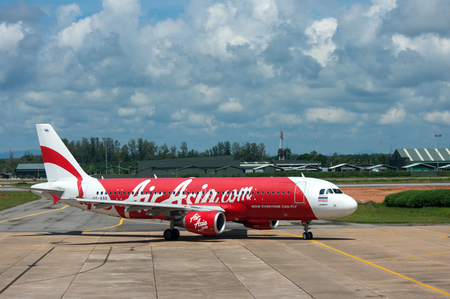 BANGKOK, THAILAND - OCTOBER 23, 2014: Air Asia aircraft in Bangkok airport on October 23, 2014. Air Asia company is the largest low cost airlines in Asia.のeditorial素材