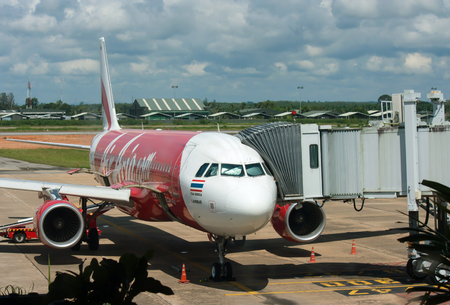 BANGKOK, THAILAND - OCTOBER 23, 2014: Air Asia aircraft in Bangkok airport on October 23, 2014. Air Asia company is the largest low cost airlines in Asia.のeditorial素材