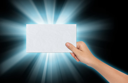 Hand of Female Holding a Blank paperの写真素材
