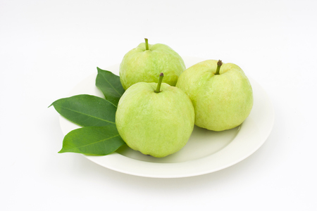 Group of Guava with leaf on dish and white backgroundの写真素材