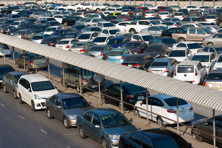 BANGKOK - FEB 14: Car parked at a park and side lot at a BTS station in Chatuchak district on FEB 14, 2015 in Bangkok, Thailand. The government has promoted park and ride to reduce traffic congestion.のeditorial素材