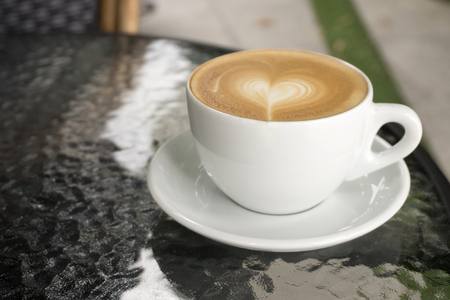Coffee cup in coffee shop - vintage style effect pictureの写真素材