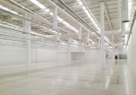 Blurred of White empty industrial warehouse or plant spaceの写真素材