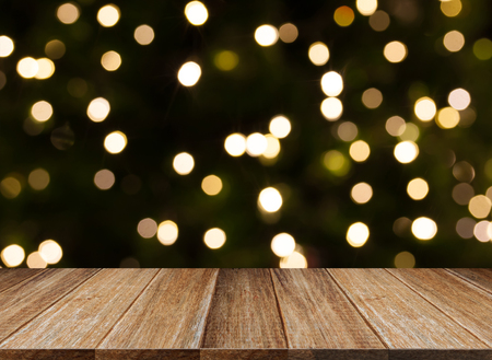 celebration background of Wood table top on colorful light bokehの写真素材