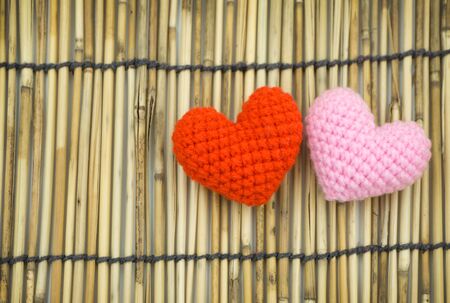 Love hearts on wooden background - valentines day card conceptの写真素材