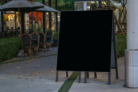 Blank label mockup on many restaurant background in city life at night.の写真素材