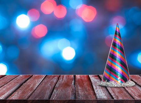 celebration background of Wood table top on colorful bokeh at nightの写真素材