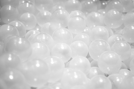 Many lots of white plastic ball or transparent bubble ball background.の写真素材