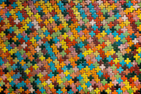 The wall is made of colorful ceramic. A ceramic is an inorganic, non-metallic, solid material comprising metal.の写真素材