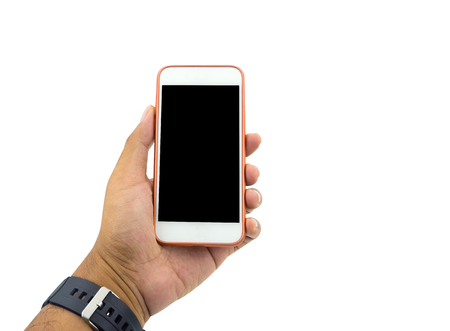 Hand holding white smart phone isolated over white background.の写真素材