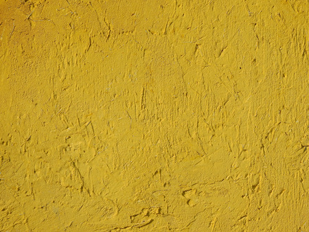 Grunge yellow background wall texture.の写真素材