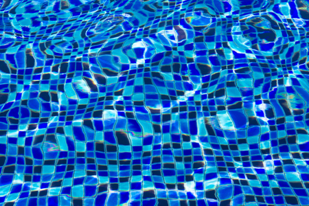 Ripple and flow with waves swimming pool bottom background.
