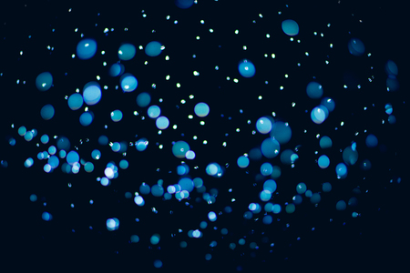 Blue color abstract bokeh background for technology theme design.の写真素材