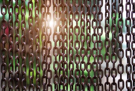 Full Frame Shot Of Metallic Chain and sunlight background.の写真素材