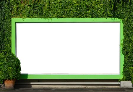 White billboard on spring summer green leaves background.の写真素材