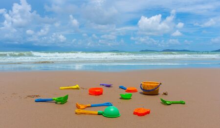 Many colorful sand toy on the white sand beach at summer time.の写真素材