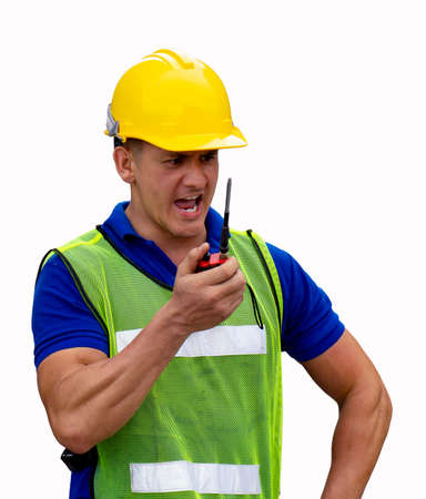industrial worker using walkie talkie isolated on white background.の写真素材