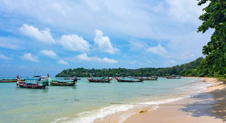 Phuket, Thailand - 06 August 2020: Fishing boats moored at Chalong Bay Pier.のeditorial素材