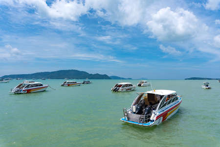 Phuket, Thailand - August 06, 2020: Group of speed boats park at Chalong Bay Pier.のeditorial素材