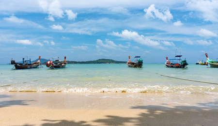 Phuket, Thailand - 06 August 2020: Fishing boats moored at Chalong Bay Pier.のeditorial素材
