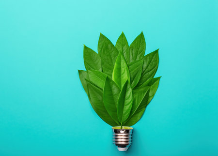 Fresh Leaves Shaped as a Green Lightbulb - Organic Growth and Eco-Consciousness - Symbolic Representation of Green Energy Lightbulb.の素材