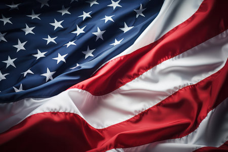 "Stars, Stripes, and Freedom: American Flag Waves Proudly in the Breeze, Bathed in Bright Light"の素材