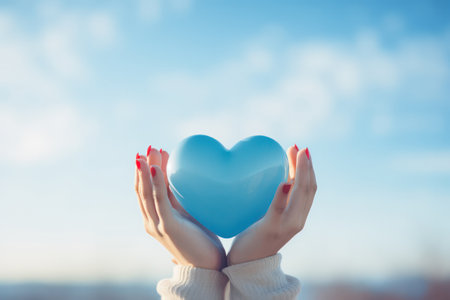 "Symbol of Love, Woman Holding Heart in the Sky"の素材