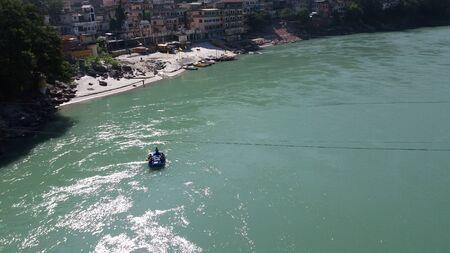 Beautiful Scene at Rishikesh of Uttar Pradesh in India. The holy river Ganges at Rishikesh which is...