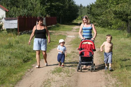 Three Generation Family walking awayの写真素材