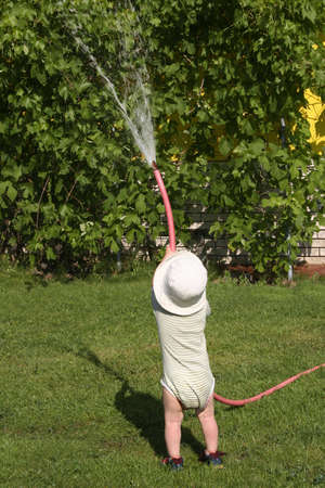 pouring grandfather boyの写真素材