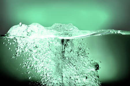 Green Water splash abstract backgroundの写真素材