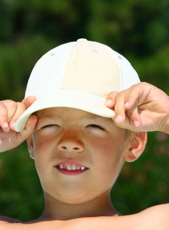 Beautiful boy having a great time outdoorsの写真素材