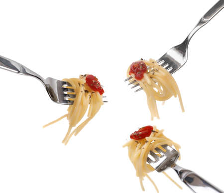 Spaghetti pasta and tomato sauce twirled on a fork.の写真素材