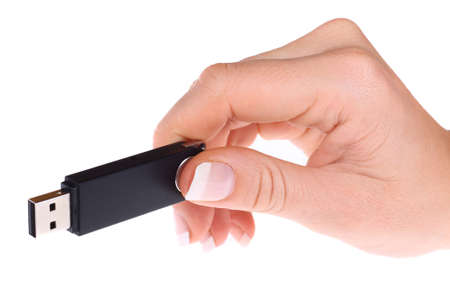 Flash drive in hand isolated on white background