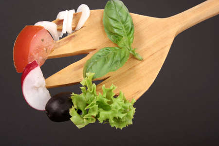 Fresh salad made of vegetables like tomatoes or cucumbersの写真素材