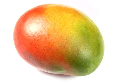 closeup of mango fruit isolated over white. vibrant coloursの写真素材