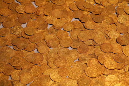 Old gold coins in British Museum - backgroundの写真素材