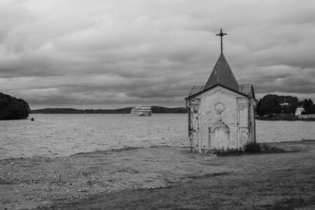 The chapel on the river shoreの写真素材
