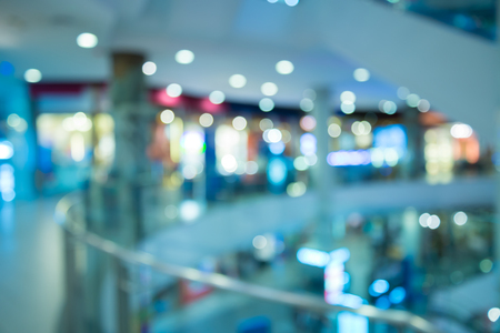 Department store shopping mall blur background with bokehの写真素材