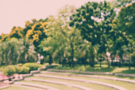 Abstract blurred big green park in city - defocus background  Vintage effect style