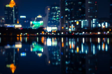 Abstract urban night light bokeh , defocused backgroundの写真素材