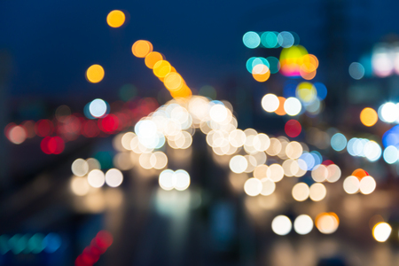 Abstract blur light car on the road traffic in twilight evening backgroundの写真素材