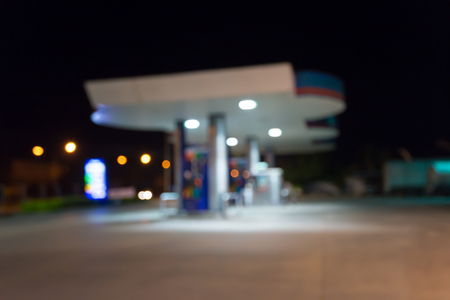 Abstract blur petrol gas station at night backgroundの写真素材