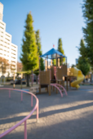 Abstract blur outdoors children playground in city park background