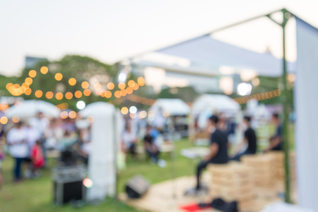 Abstract blur people in day festival city park bokeh backgroundの写真素材