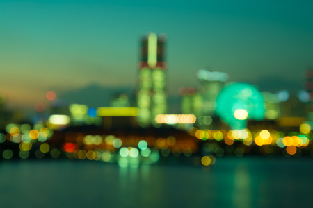 Defocused cityscape in twilight evening bokeh background, Yokohama Japanの写真素材