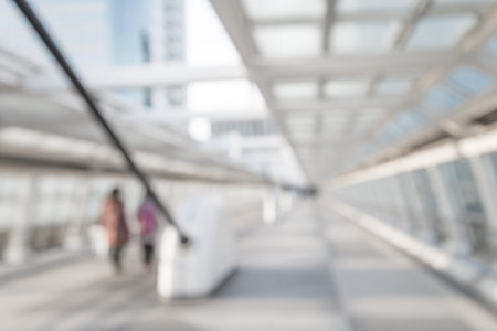 Abstract white blur people in building hallway corridor backgroundの写真素材